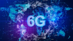 Concept de la technologie 6G avec un texte en surbrillance et un globe terrestre connecté par des lignes et des réseaux numériques.