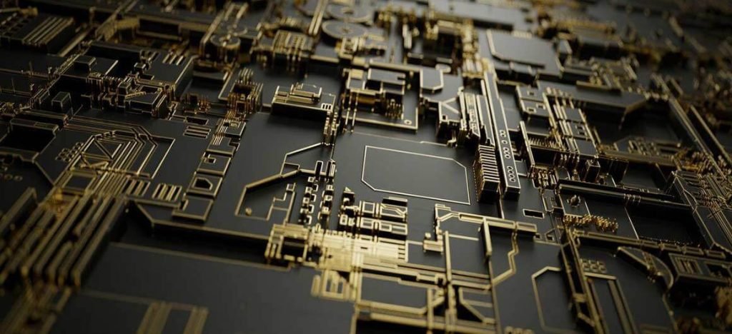 Circuit imprimé noir et or avec des détails complexes de composants électroniques.
